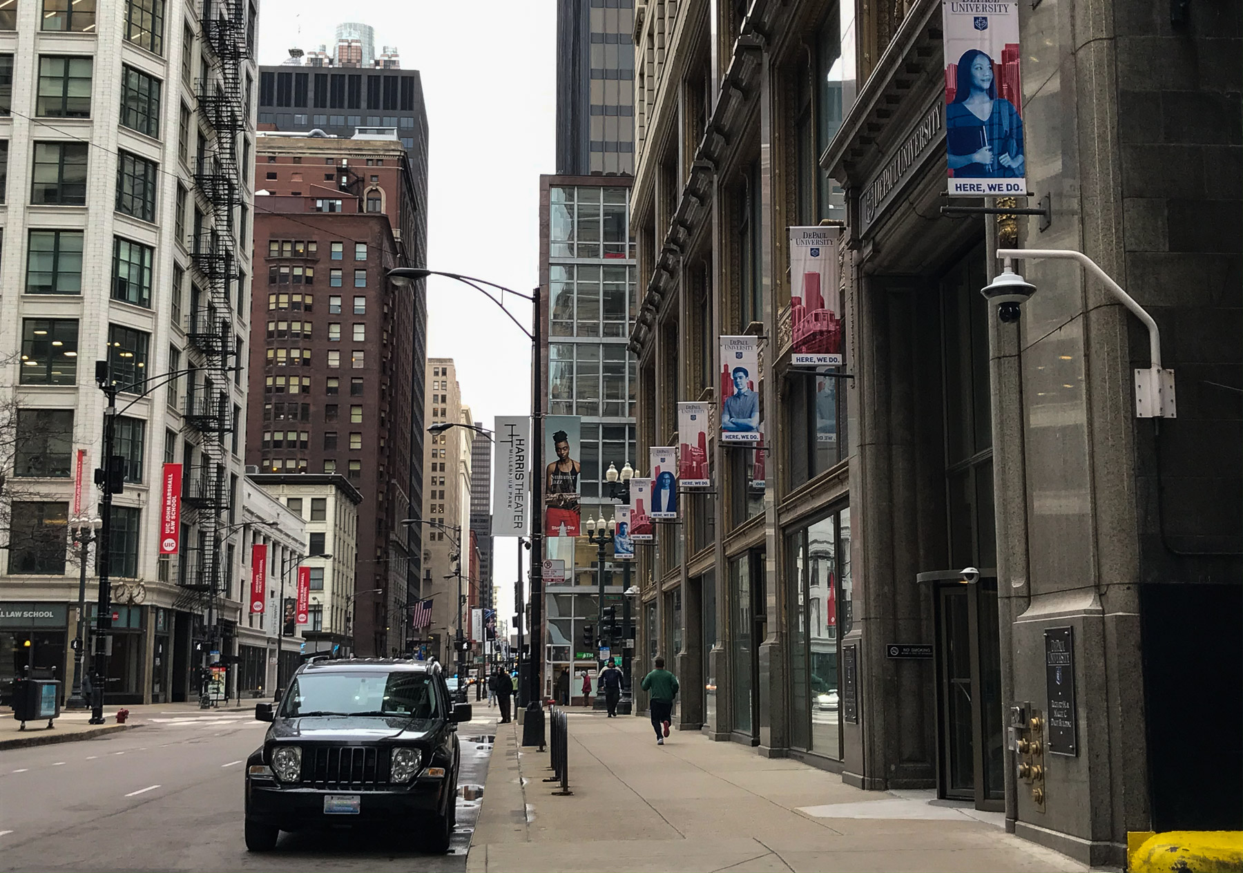 With quiet streets and a dry Chicago afternoon, joggers were able to get a daily run on the sidewalks of Jackson Blvd. (DePaul University/Randall Spriggs)